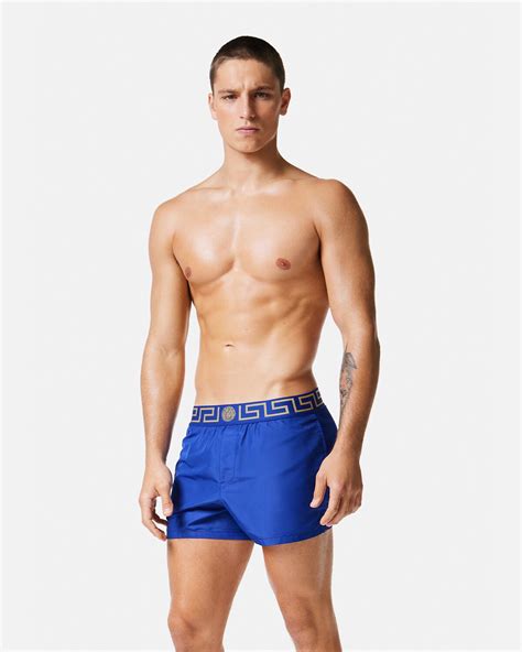 versace swim shorts mens|greca border swim shorts.